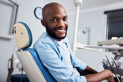 Happy man in Dental Chair