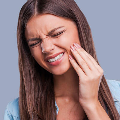 Woman with jaw pain